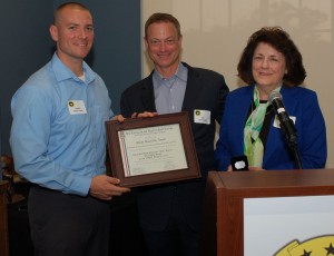 Maj. Daniel Leard, first recipient of the Lt. Col. Boyd McCanna “Mac” Harris Leadership Award, Gary Sinise, and Ann Harris at the Foundation dinner June 12, 2014. 