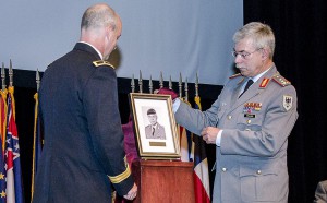 Lt. Gen. Jorg Vollmer, right, and CGSC Deputy Commandant Brig. Gen. John Kem unveil the IHOF portrait of Vollmer during the ceremony May 9. Click the photo for more images from the ceremony.