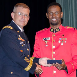 International officers receive graduation badges