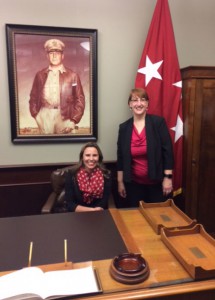 Jen Parker (seated), recruitment manager for Burns & McDonnell, and Sue Maden, education and training manager for Burns & McDonnell, take a photo in the General MacArthur Room in the Lewis and Clark Center during their tour March 9.