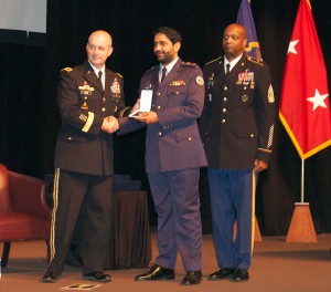 Lt. Col. Meshari M. Alhaddad of Kuwait receives his international officer badge from Maj. Gen. Kem. Alhadad was also announced as the winner of the Major General Hans Schlup Award for the 2017 class.