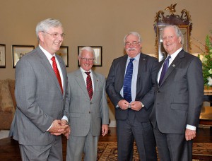 Skip Palmer, second from left, at the Foundation's April 2016 outreach event in Kansas City. From left, CEO Doug Tystad, Palmer, Trustee Mike Meyer, and Trustee John Robinson.