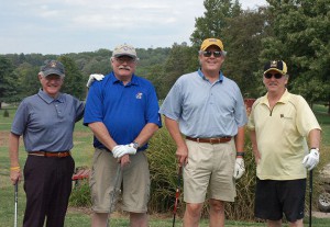 Skip Palmer, left, with his team in the 2012 CGSC Foundation golf tournament.