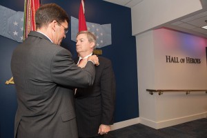 Secretary of the Army Dr. Mark T. Esper presents the CASA lapel pin to Foundation Chair Mike Hockley during the ceremony.