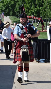 British Pipe Major John Harvey approaches the National World War I Memorial in Kansas City to open the annual Memorial Day Ceremony on May 27.