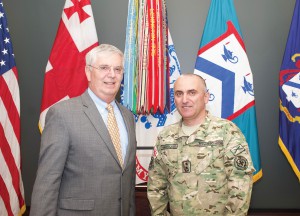 CGSC Foundation President/CEO Col. (Ret.) Doug Tystad takes a photo with Major General Vladimer Chachibaia, Chief of the General Staff of the Georgian Armed Forces, after presenting him with a Foundation coin. (photo by Mark H. Wiggins)