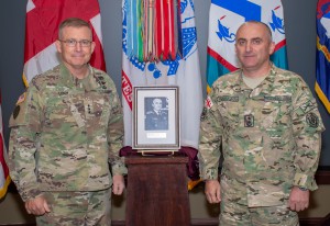 CGSC Commandant Lt. Gen. Michael Lundy and Major General Vladimer Chachibaia, Chief of the General Staff of the Georgian Armed Forces, posed with the portrait of Chachibaia that will be displayed in the International Hall of Fame gallery in the Lewis and Clark Center. (Photo by Jim Shea/ArmyU Public Affairs)
