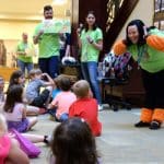 Photo of children and CARL library staff at the kick-off event May 24, 2019, for the Fort Leavenworth youth summer reading program.