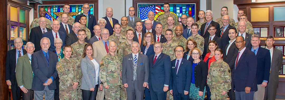 Group photo of the National Security Roundtable program guests, faculty and CGSC Foundation leadership in the atrium of the Lewis and Clark Center Oct. 2, 2019