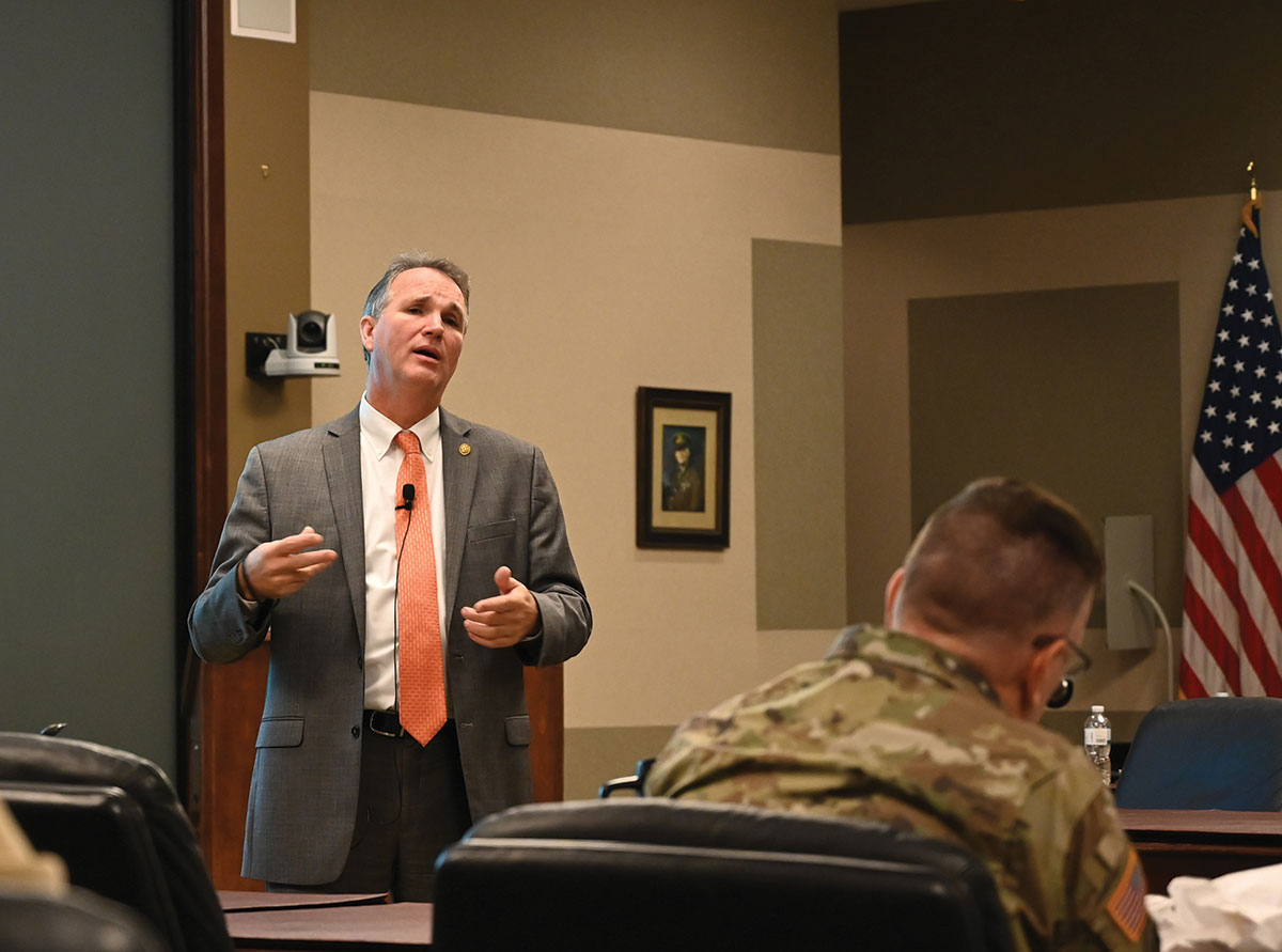 Mr. Larry Hisle, the executive director of the Greater Kansas City Federal Executive Board, leads a discussion about the programs and mission areas of the Federal Executive Board during the InterAgency Brown-Bag Lecture conducted Nov. 26, 2019, in the Lewis and Clark Center’s Arnold Conference Room.