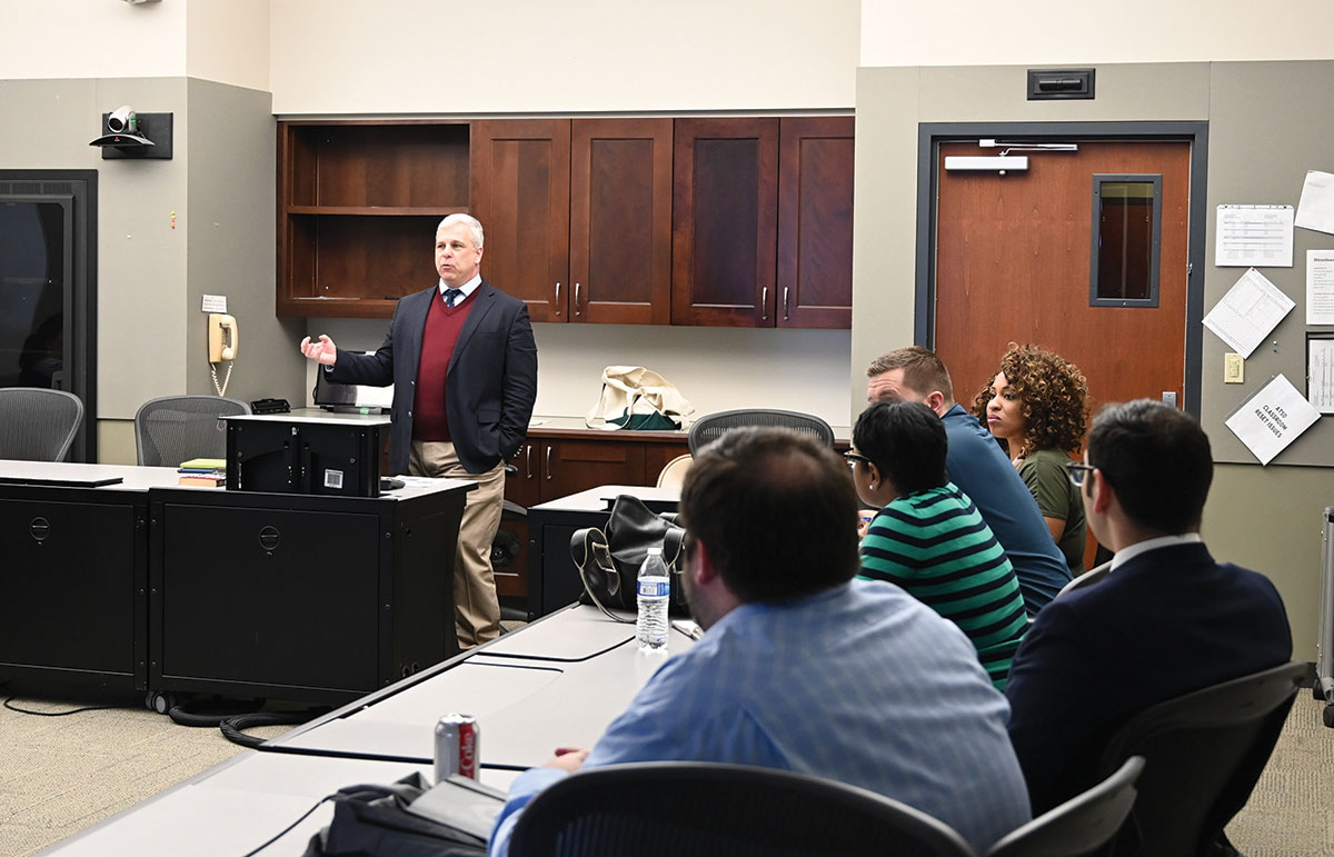 Professor Chris Johnson from CGSC’s Department of Military History leads his group in a discussion on the practical relevance of history entitled “Looking to the Past to Consider the Future.”