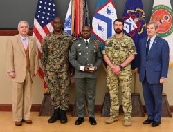 From left, CGSC Foundation President/CEO Rod Cox, Maj. Kevron W. Henry from Jamaica (2nd place - General Douglas MacArthur Military Leadership Writing Award), Capt. Abdel-Aziz Ali Orou from Benin (recipient of the Major General Hans Schlup Award), Maj. Alessio Battisti from Italy (recipient of the General Dwight D. Eisenhower Award and the Father Donald Smythe Military History Award) and Foundation Chairman Mike Hockley.