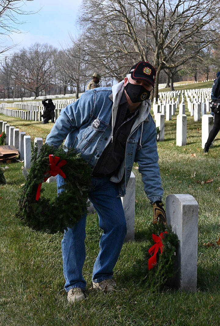 Foundation President/CEO Rod Cox assists with laying wreaths on Dec. 19, 2020, at the Fort Leavenworth National Cemetery.