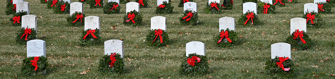 image of wreaths on gravestones in the Fort Leavenworth National Cemetery- photo taken Dec. 19, 2020.