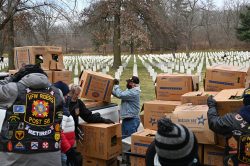 CGSC Foundation President/CEO Rod Cox assists with unloading wreaths on Dec. 19, 2020, at the Fort Leavenworth National Cemetery.
