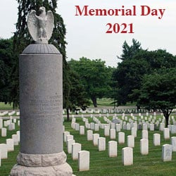 Fort Leavenworth National Cemetery with the Col. Henry Leavenworth monument in the foreground.