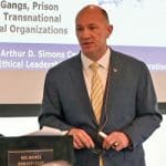 Lt. Col. (Ret.) John Nelson, chief executive officer of Morris, Nelson & Associates, LLC, and a senior research fellow of the Arthur D. Simons Center, delivers his presentation on Counter Human Trafficking at the Des Moines Embassy Club on May 20, 2021, in the inaugural event of the Simons Center National Security Forum.