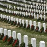 wreath-pick-up-420px image of wreaths on graves in the Fort Leavenworth National Cemetery