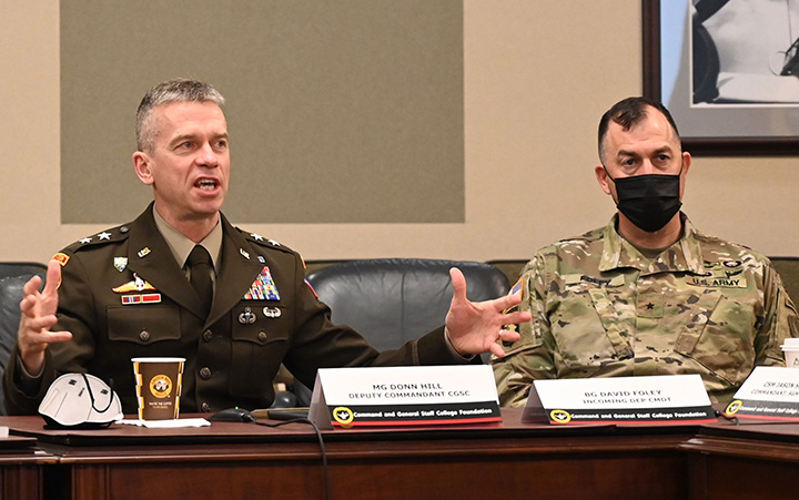Outgoing CGSC Deputy Commandant Maj. Gen. Donn Hill, left, and incoming Deputy Commandant Brig. Gen. David Foley speak at the CGSC Foundation board of trustees meeting March 30, 2022.