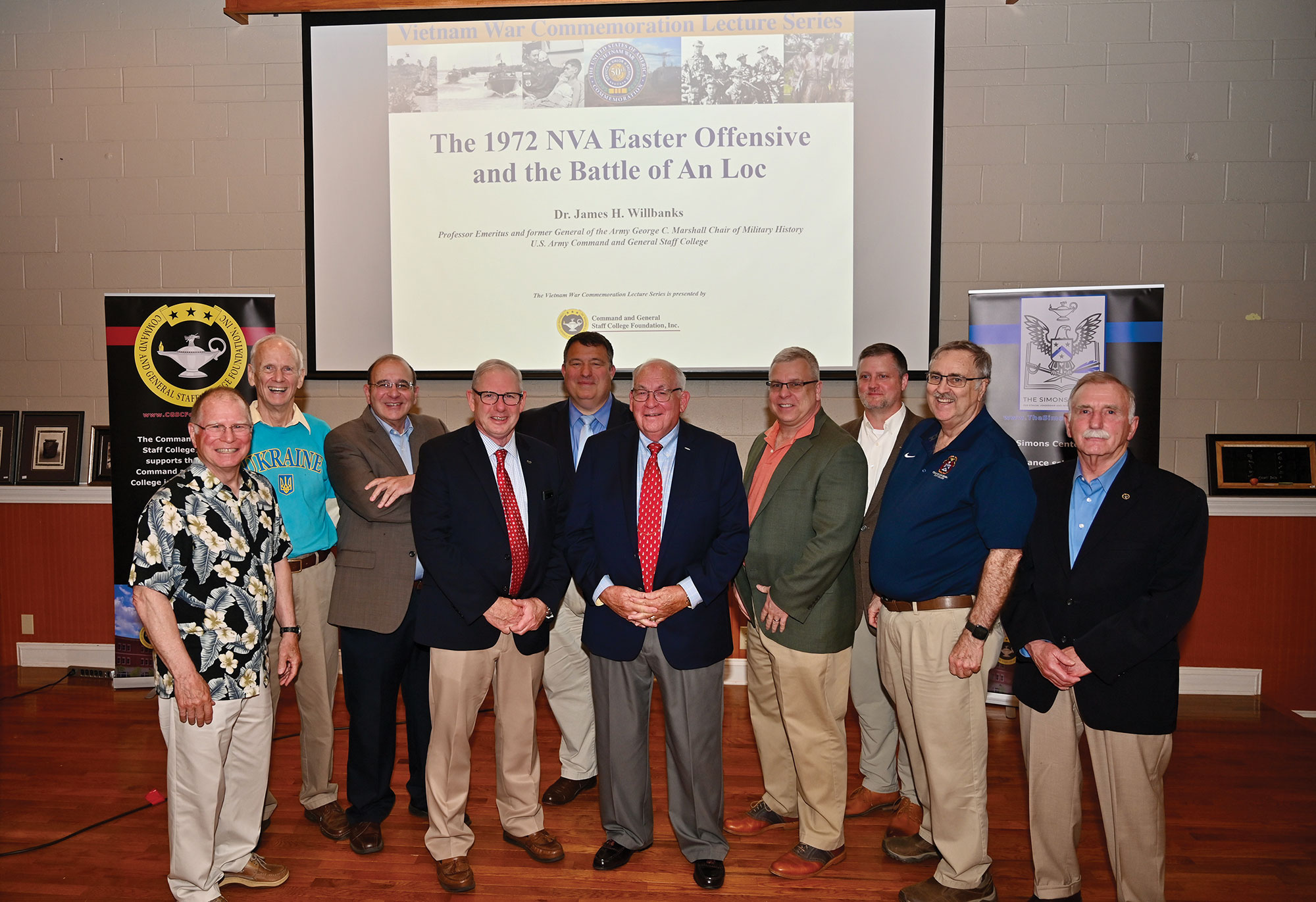 Dr. James H. Willbanks, CGSC Professor Emeritus, gathers with some of his old CGSC colleagues after his lecture  for the CGSC Foundation's Vietnam War Commemoration Lecture Series on May 12, 2022, at June's Northland in downtown Leavenworth, Kansas.