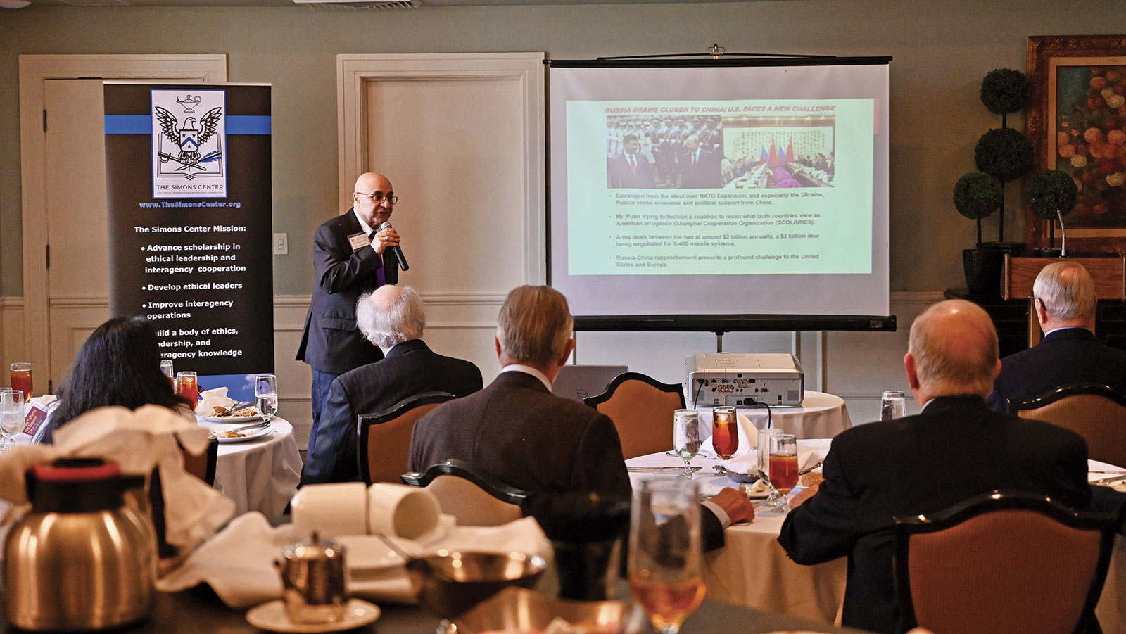 Dr. Mahir Ibrahimov, director of the Cultural and Area Studies Office (CASO), U.S. Army Command and General Staff College, delivers his presentation "Across Cultures and Empires" for the Arter-Rowland National Security Forum luncheon event on May 26, 2022, at the Carriage Club in Kansas City.