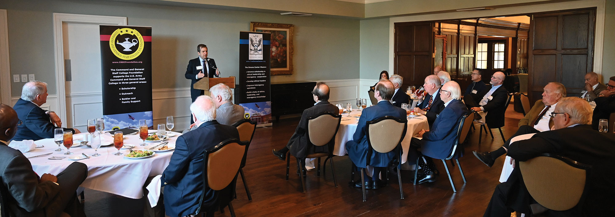 Business reporter and author Christopher Leonard delivers his presentation on the Federal Reserve bank for the Arter-Rowland National Security Forum luncheon event on Oct. 20, 2022, at the Carriage Club in Kansas City.