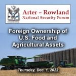 Composite image with ARNSF logo over a photo of a combine and a tractor harvesting wheat in a Kansas field with grain elevators in the distance. Under the logo is the text of the topic of the ARNSF on Dec. 1, 2022 which is "Foreign Ownership of U.S. Food and Agricultural Assets."