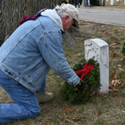 CGSC Foundation President/CEO Rod Cox participates in honoring veterans with wreaths on national Wreaths Across America Day, Dec. 17, 2022, at the Fort Leavenworth National Cemetery.