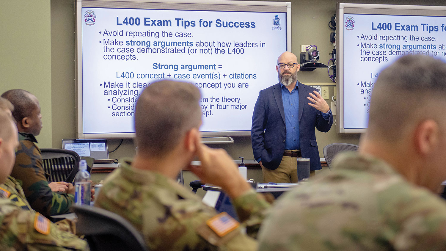 Dr. Trent Lythgoe, Command and General Staff College Educator of the Year, prepares Command and general Staff College students for an upcoming exam, Jan. 20, at Fort Leavenworth’s Lewis and Clark Center.