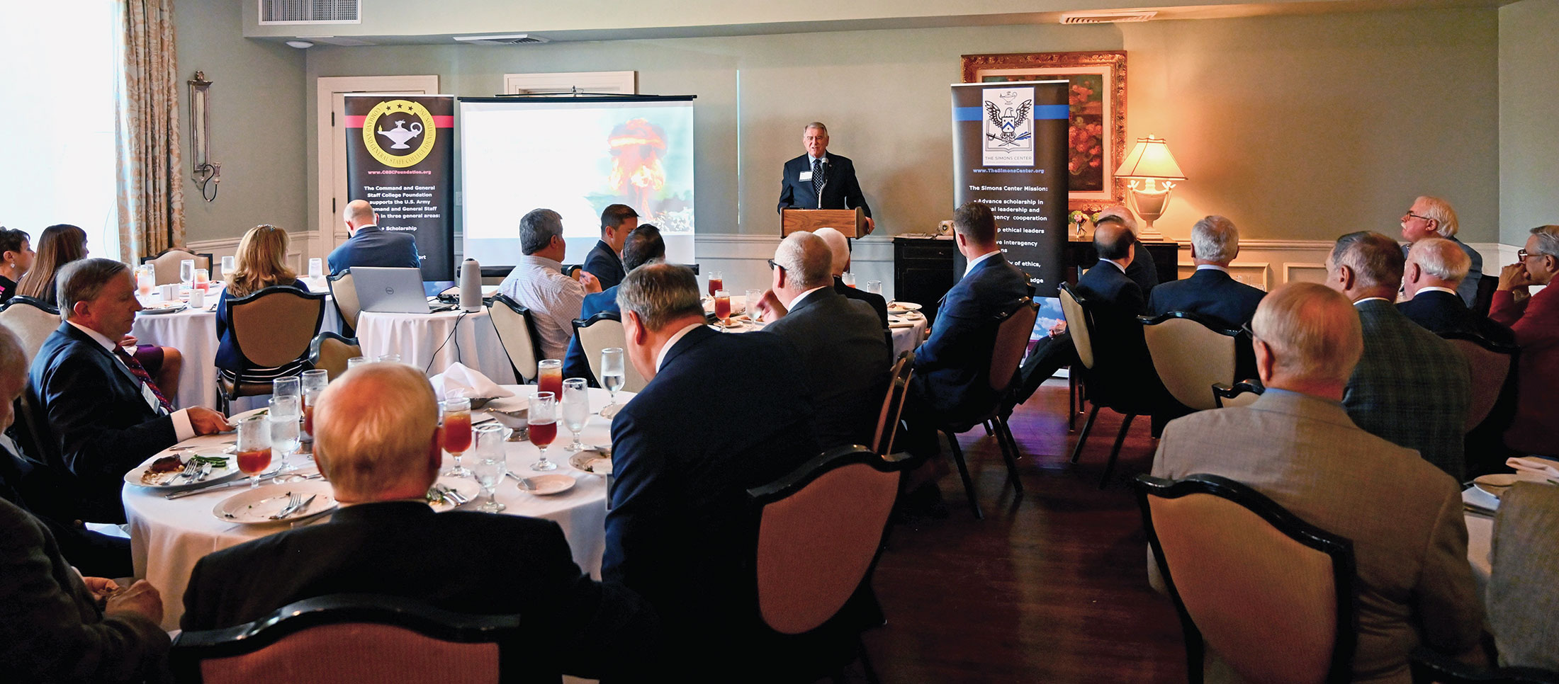 Retired Colonel Bob Ulin, founder and director of the Simons Center, delivers his presentation on nuclear weapons in Europe during the 1970s and 80s during the Arter-Rowland National Security Forum luncheon event on Sept. 21, 2023, at the Carriage Club in Kansas City.