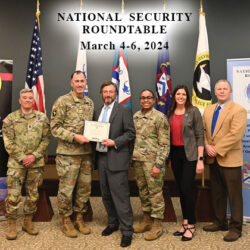 CGSC Deputy Commandant Brig. Gen. David Foley presents Mr. Hunter Wolbach, senior vice president of UBS Financial Services in Kansas City, with an NSRT certificate of appreciation at the conclusion of the program on March 6, 2024. From left: Command Sgt. Maj. Jason Porras; Foley; Wolbach; Wolbach’s student escort Maj. Blaire Griffin; CGSC Foundation President/CEO Lora Morgan; and CGSC Associate Dean of Academics Dr. Robert Davis.