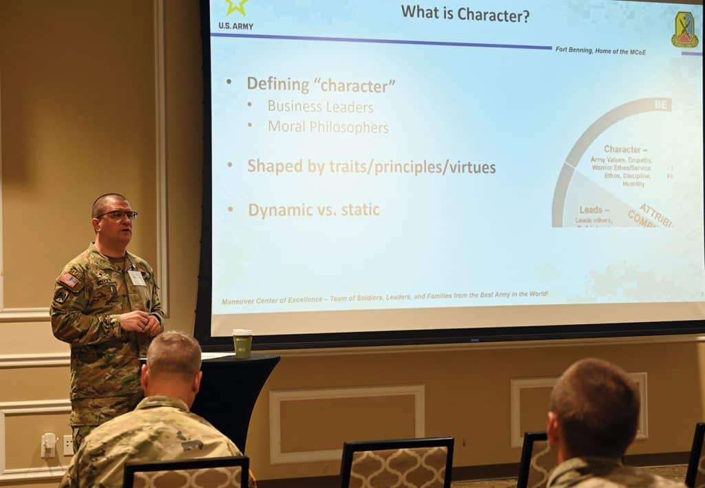 Chaplain (Maj.) Steven Echols, Chaplain Ethicist and Ethics Instructor, U.S. Army Maneuver Center of Excellence, Fort Leonard Wood, Missouri, presents his paper entitled “Is Your Character Prepared for War” during the CGSC Military Ethics Symposium, April 1, 2025.