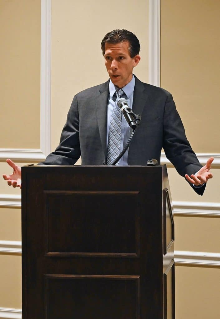 The CGSC Foundation's new General Hugh Shelton Distinguished Visiting Chair of Ethics Dr. Paul David Miller, a professor at Georgetown University, delivers his keynote address "Moral Readiness for a Just Large-Scale Combat Operation" during the 2025 CGSC Military Ethics Symposium on April 1, 2025, at Fort Leavenworth's Frontier Conference Center.