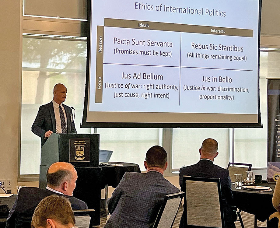 U.S. Air Force Col. Paul Vicars, Ph.D., assistant professor with the U.S. Army School of Advanced Military Studies at Fort Leavenworth, Kansas, delivers a presentation entitled "Balancing Ideals and Interests in International Politics" during the Des Moines National Security Forum at the Des Moines Embassy Club West in West Des Moines, Iowa on May 22, 2025.