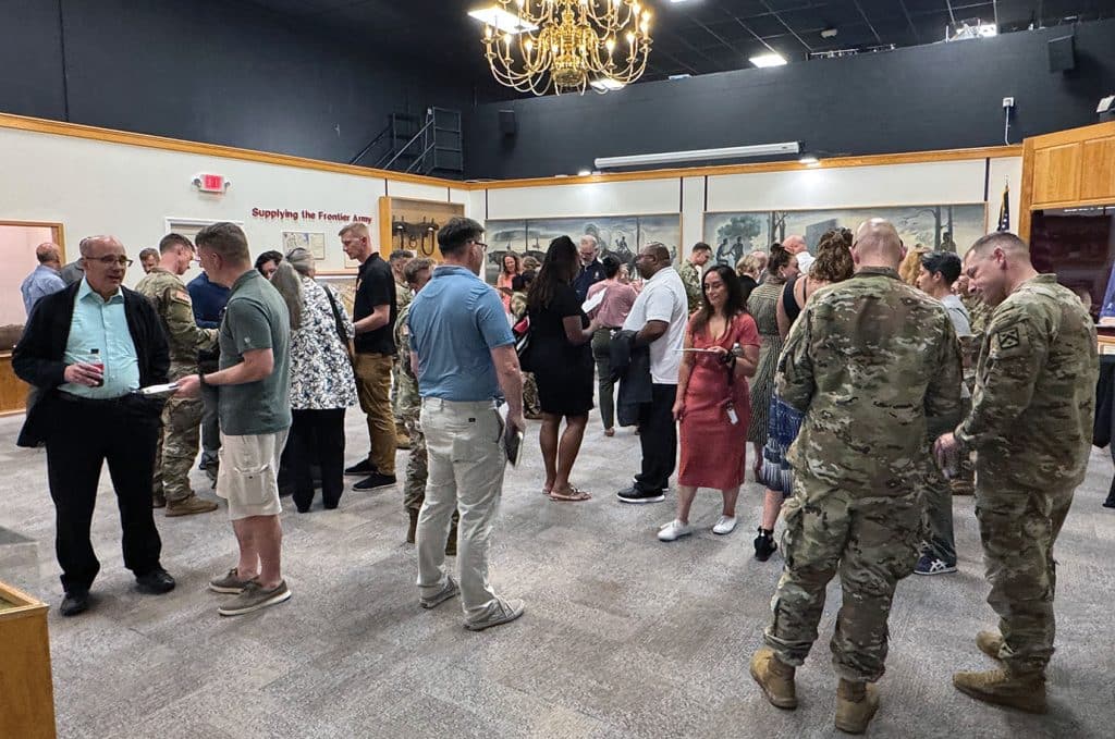 CGSOC students 'work the room' speaking with mentor prospects during the CGSC Mentor Program networking event Aug. 20, 2025 in the Frontier Army Museum.