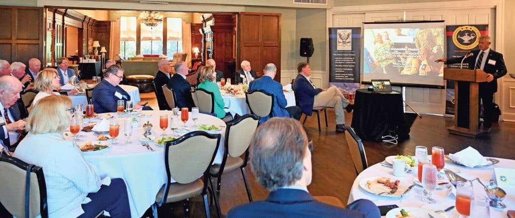 Retired Lt. Gen. Robert L. Caslen, Jr., the former chief of the Office of Security Cooperation in Iraq, conducts a presentation and discussion on his recently published book "The Impossible Mission," during during the Arter-Rowland National Security Forum luncheon event on at the Carriage Club in Kansas City on Oct. 16, 2025.