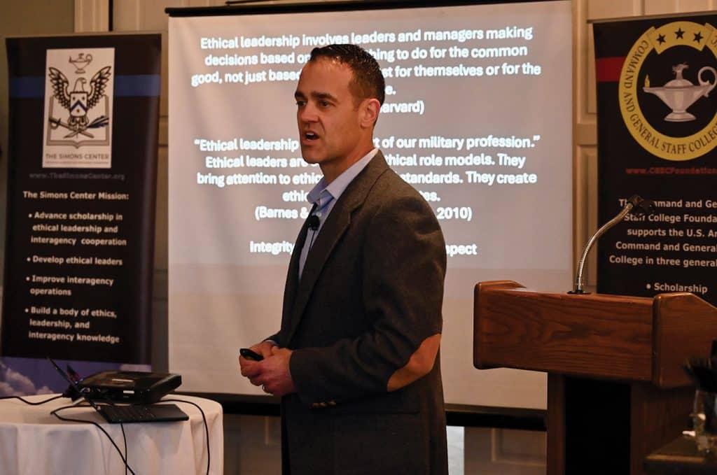Col. Andrew Steadman, director of the Army University Press at Fort Leavenworth, Kansas, conducts a presentation and discussion about ethical leadership during the Arter-Rowland National Security Forum luncheon event at the Carriage Club in Kansas City on Jan. 15, 2026.
