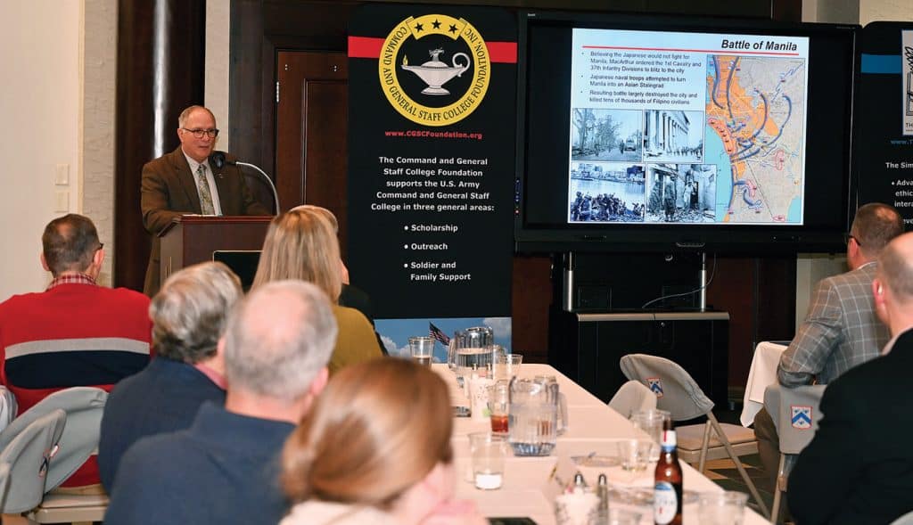 Peter Mansoor, Ph.D., a retired Army colonel, author and frequent media commentator on national security affairs, provides a presentation on his most recent book, "Redemption: MacArthur and the Campaign for the Philippines," at a dinner hosted by the CGSC Foundation and Alumni Association, Feb. 2, 2026, in the atrium of the Lewis and Clark Center on Fort Leavenworth, Kansas.