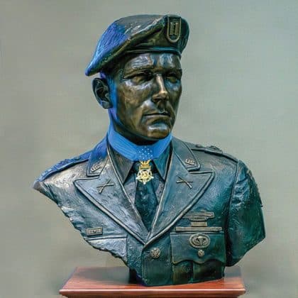 A bronze bust depicting retired U.S. Army colonel Roger H.C. Donlon, the first service member and Green Beret of the Vietnam War to receive the Medal of Honor, and long-time U.S. Army Command and General Staff College supporter, was dedicated to the college in a ceremony March 25, 2026, at the Lewis and Clark Center on Fort Leavenworth. (U.S. Army photo by Jim Shea)