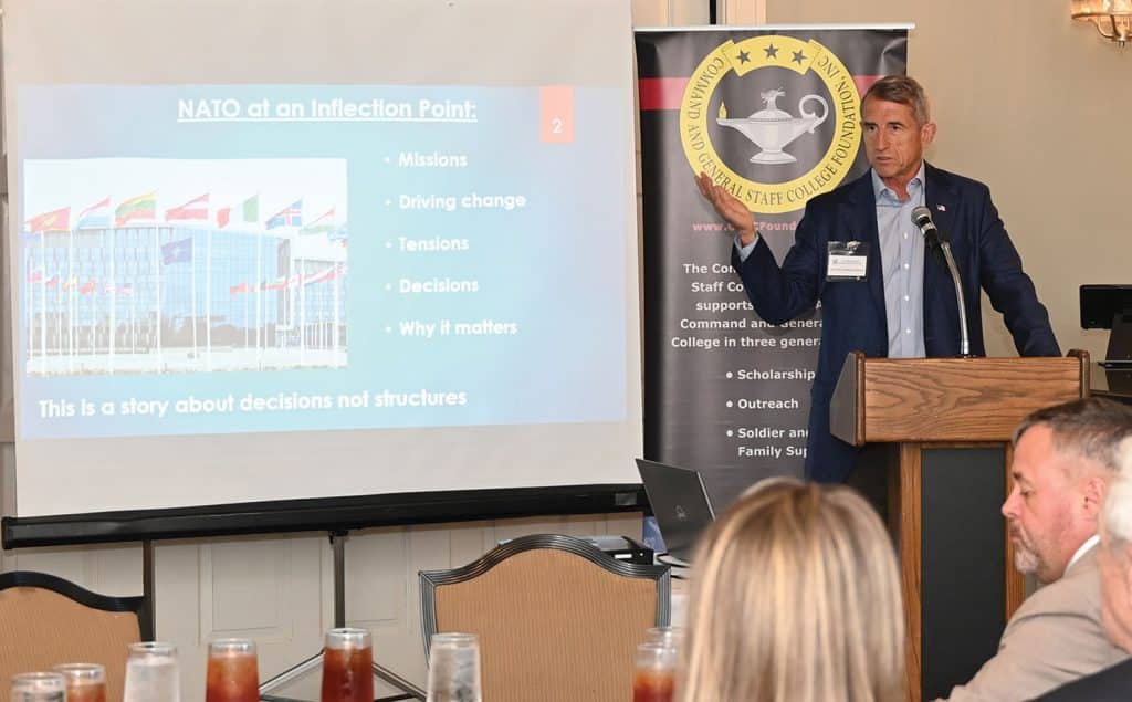 Maj. Gen. (Ret.) William Hickman, a veteran with extensive NATO experience, conducts a presentation and discussion about NATO during the Arter-Rowland National Security Forum luncheon event at the Carriage Club in Kansas City on April 16, 2026.