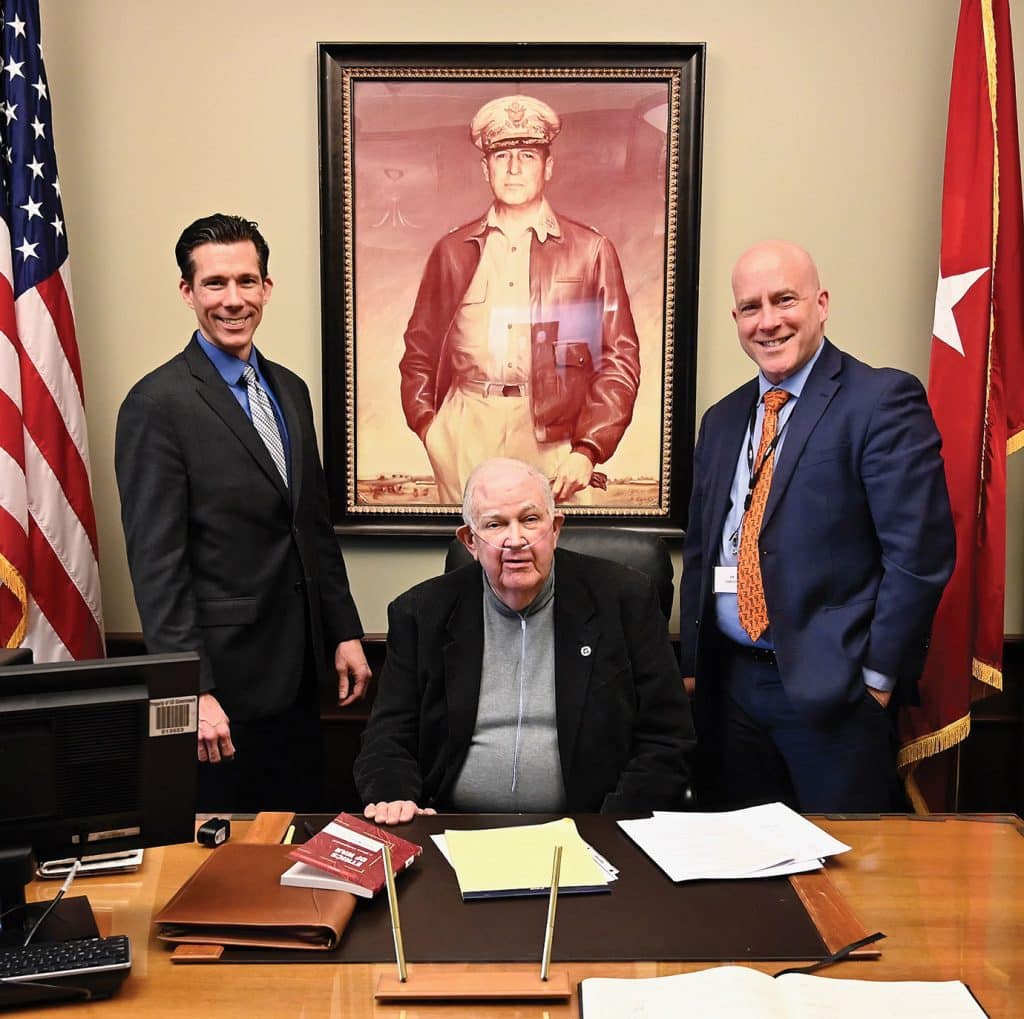 Col. (Ret.) Bill Eckhardt, center, member of the CGSC Foundation Board of Trustees, meets with Paul David Miller, Ph.D., left, and Marc LiVecche, Ph.D., during a break in the CGSC Military Ethics Symposium, March 27, 2026, in the Lewis and Clark Center's MacArthur Room on Fort Leavenworth, Kansas.