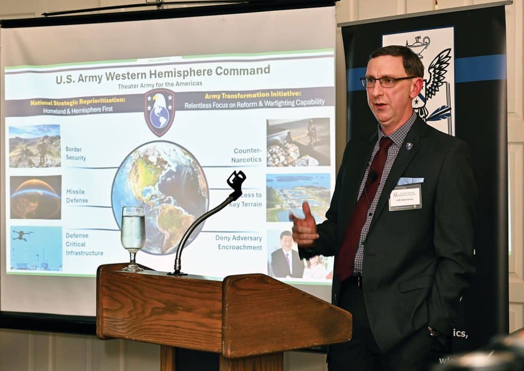 Army Strategist Col. Nathan K. Finney, provides members of the Arter-Rowland National Security Forum with a briefing on the establishment of the U.S. Army Western Hemisphere Command, the U.S. Army’s newest Theater Army/Army Service Component Command, during an ARNSF luncheon event at the Carriage Club in Kansas City on June 18, 2026.