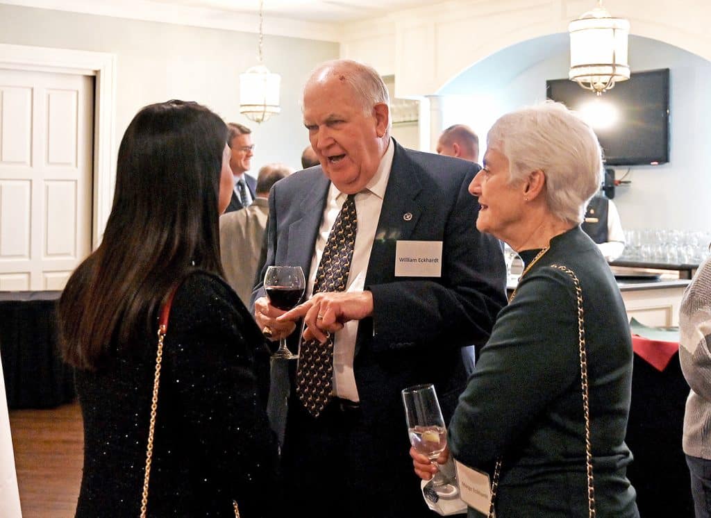 Col. (Ret.) Bill and Marge Eckhardt mingle with other guests during the CGSC Foundation's holiday reception Dec. 16, 2021, at the Carriage Club in downtown Kansas City.