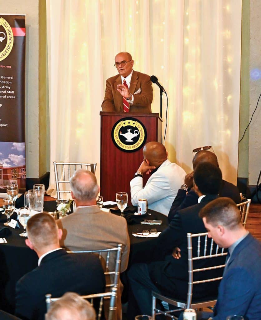 Retired Col. Gregory Fontenot delivers a presentation on "Lariat Advance," a book he co-edited, during the Distinguished Speaker Series event hosted by the CGSC Foundation and Alumni Association at JW Crancer's in Leavenworth, Kansas on Oct. 14, 2026.
